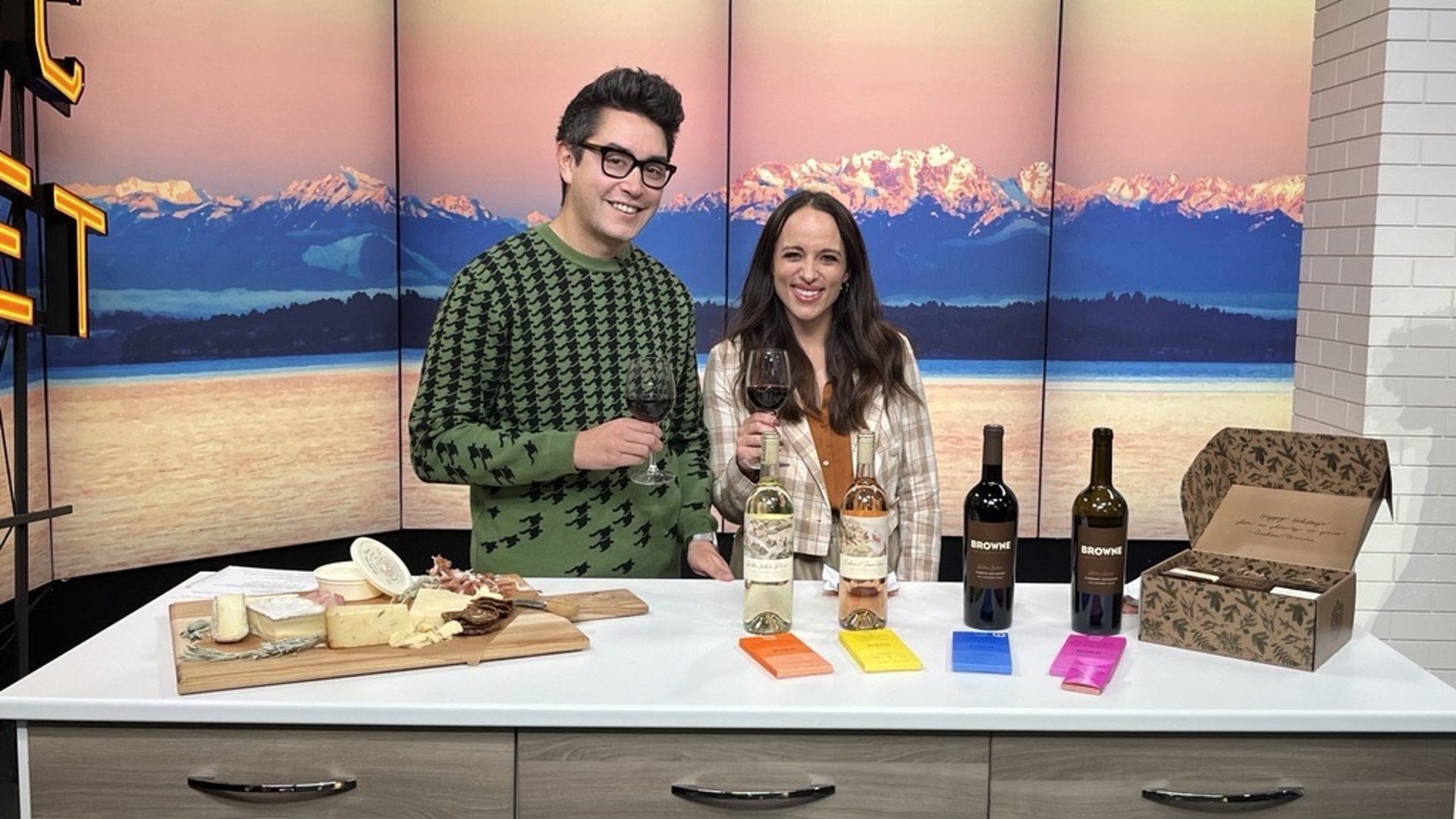 Kelly and Executive Producer Joseph Suttner try wine and chocolate pairings from Browne Family Wines and award-winning cheese from American Cheese Society. #newdaynw