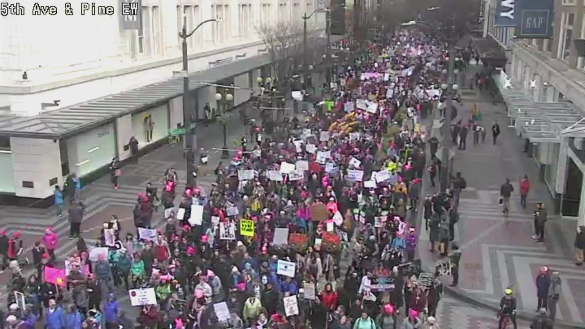 Take in a birds-eye view of the Womxn’s March as it winds downtown Seattle on January 19, 2019.