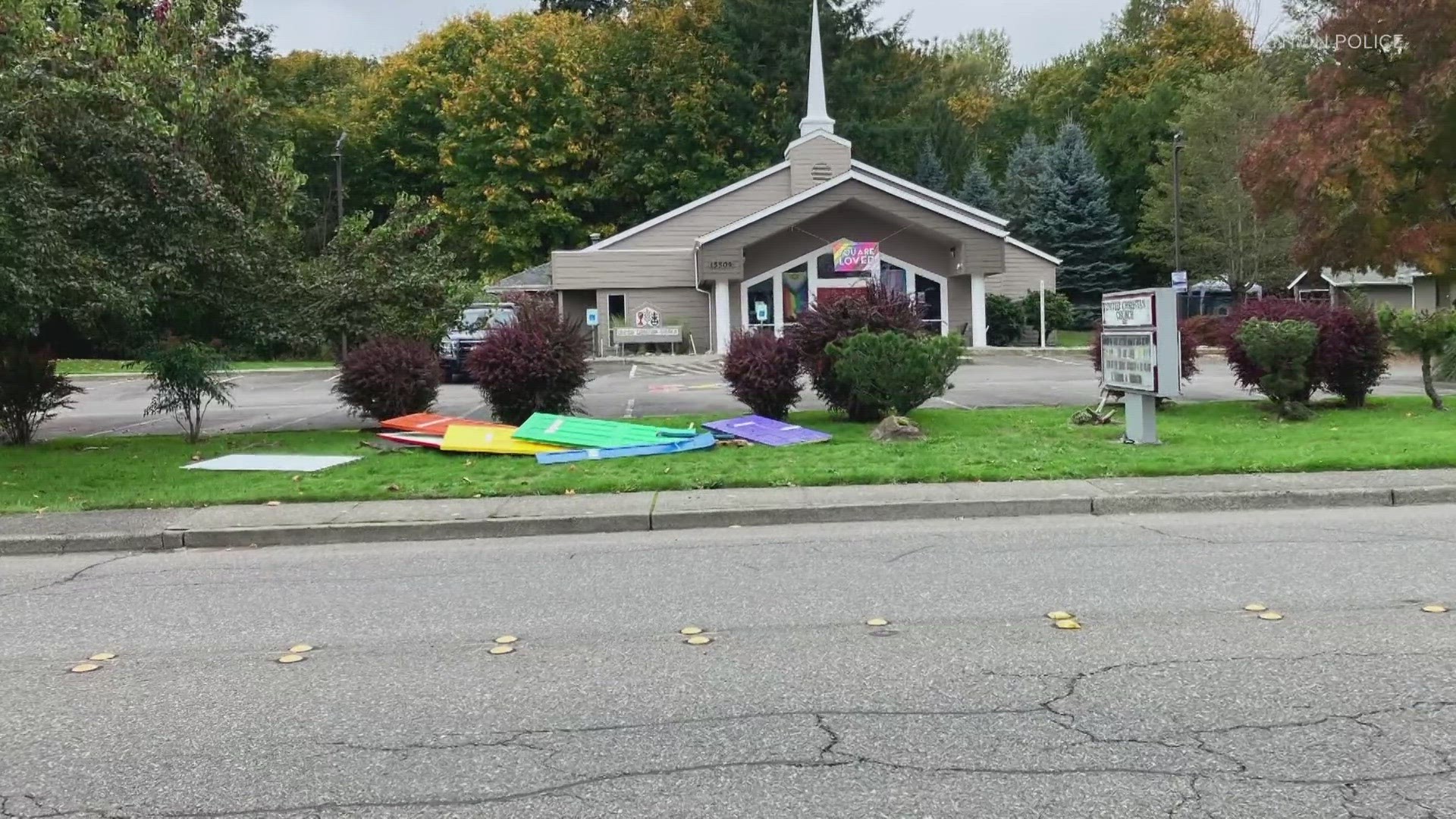 Renton police believe someone drove through a display of rainbow doors reading “God’s doors are open to all” at United Christian Church. It caused $1,800 of damage.