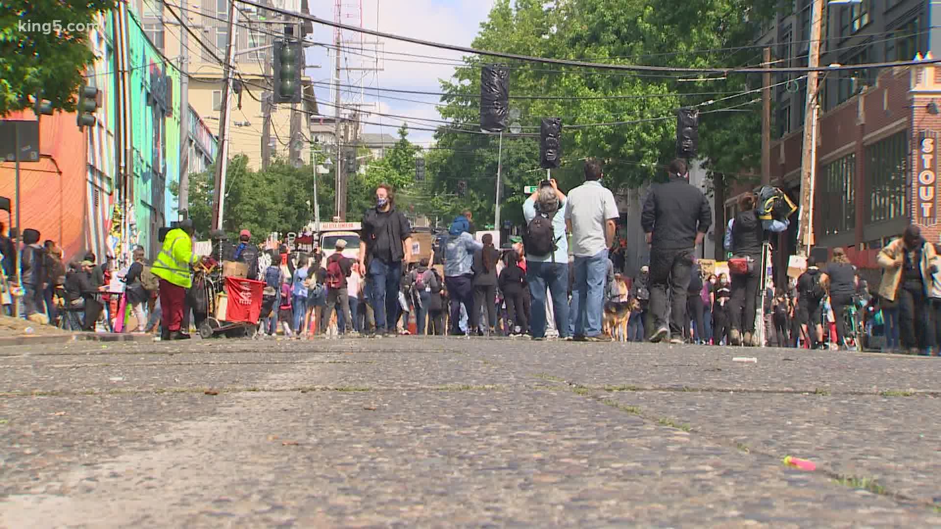 Seattle Police have opened up streets in the Capitol Hill neighborhood and are "meeting peace with peace".