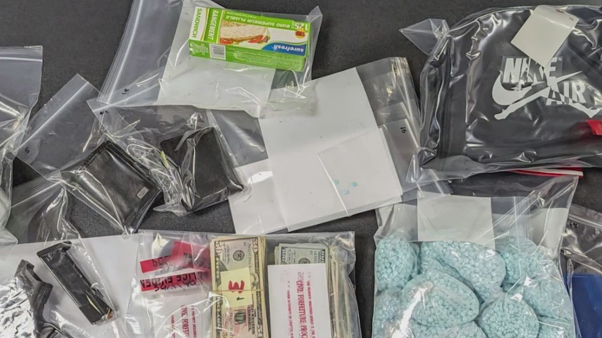 Tacoma police seized approximately 22,000 fentanyl pills, $10,750 in cash and a stolen handgun at the suspect residence and vehicle.