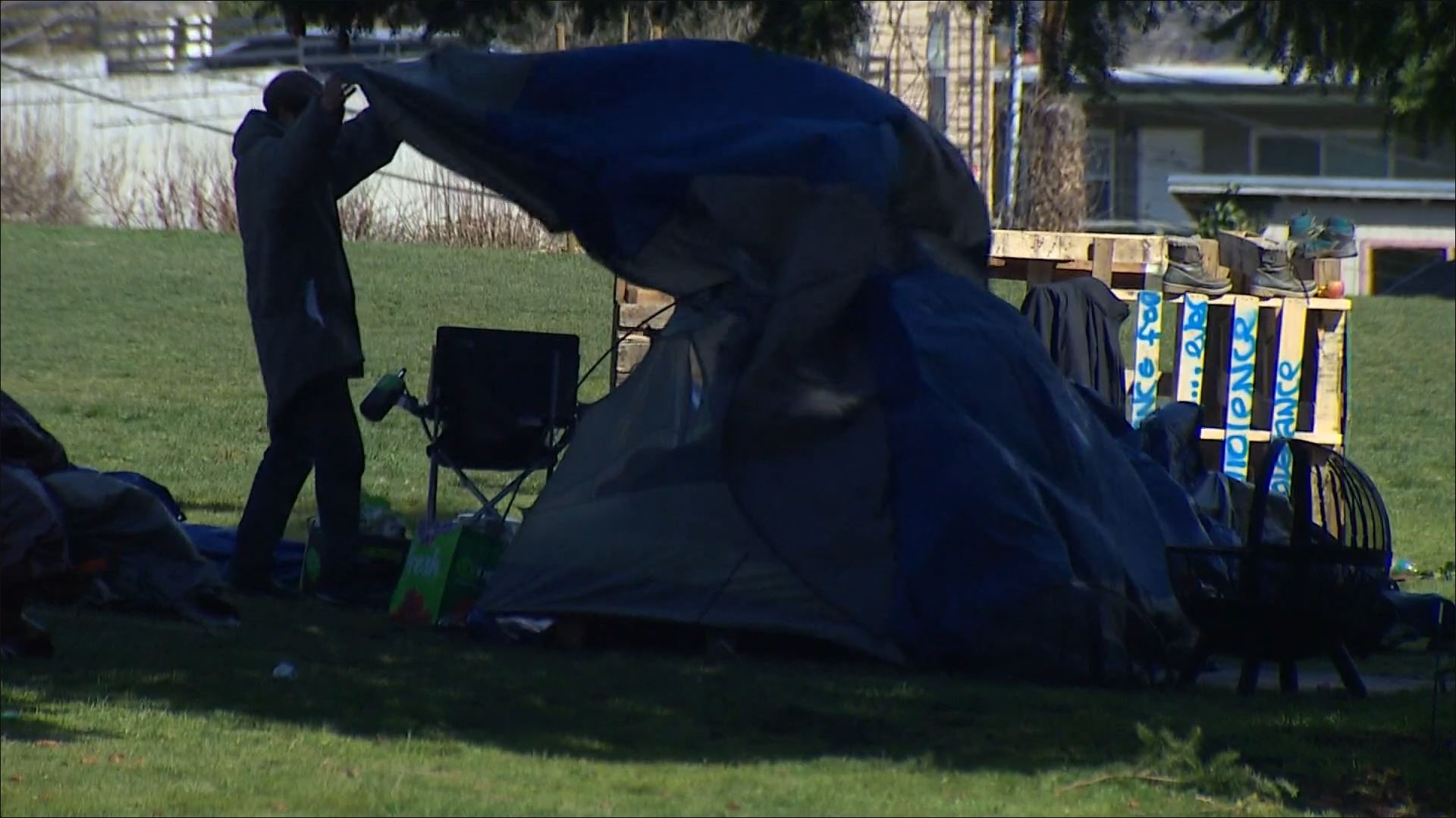 The camp was supposed to be dismantled last Friday. It remains in the middle of a residential neighborhood.