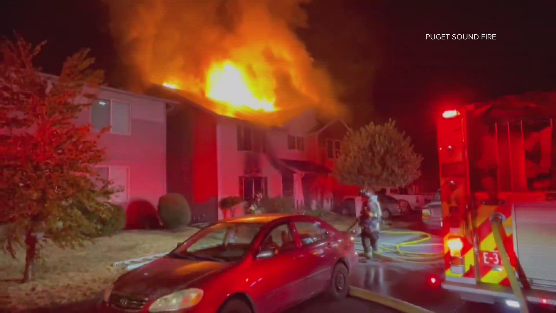 Smoke alarms roused several people after their home caught fire in Kent. One person was hospitalized.