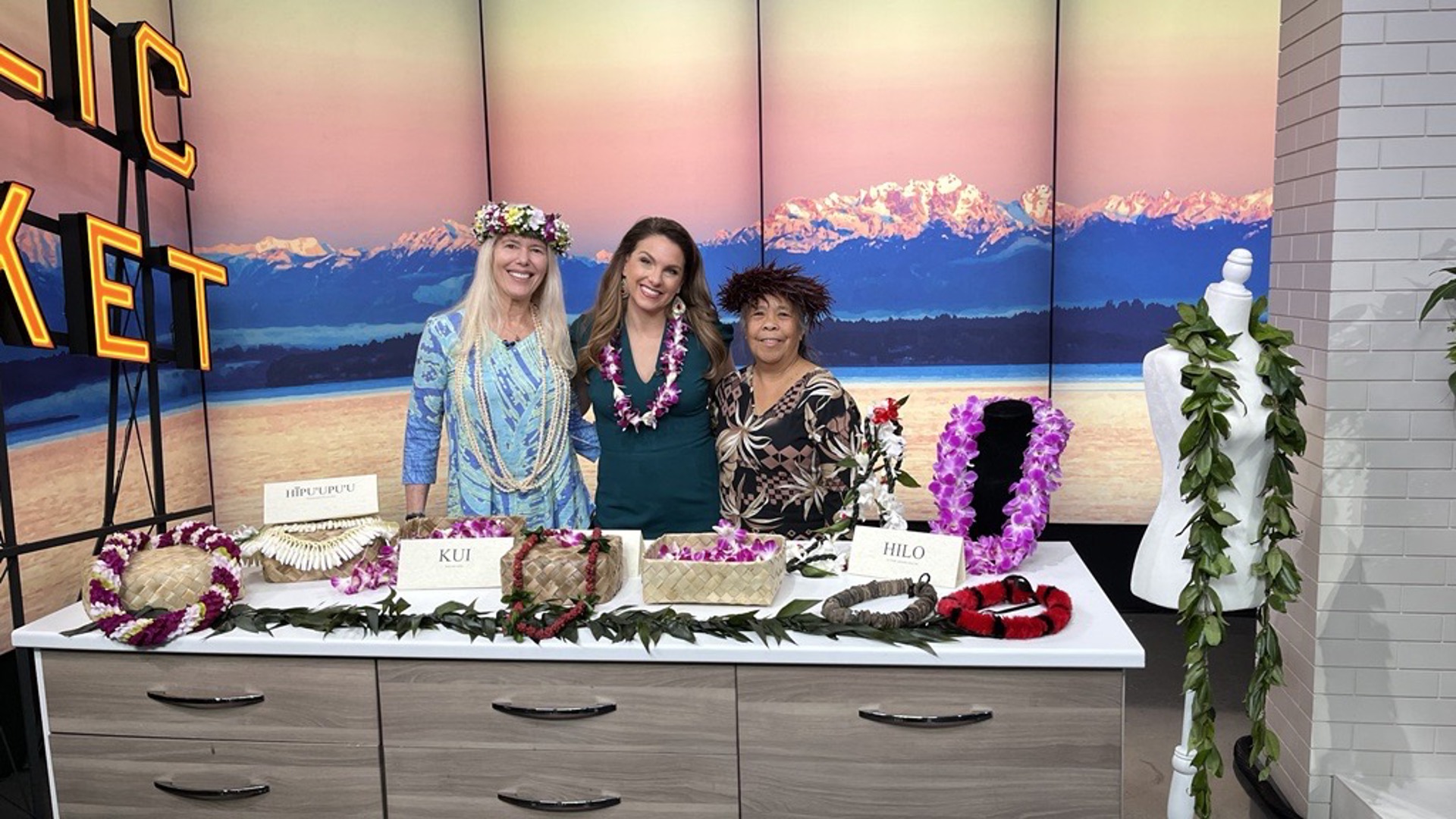 Owner of Seattle's Hawaii General Store and HGS Travel, Gail Stringer, explains the tradition of giving leis to graduates and shows Amity how to make one. #newdaynw