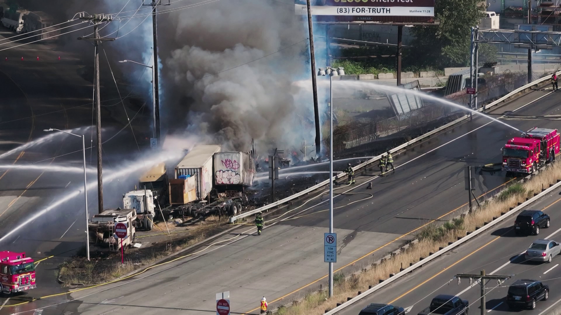 The fire at First Avenue South and East Marginal Way ignited a few power poles July 9.