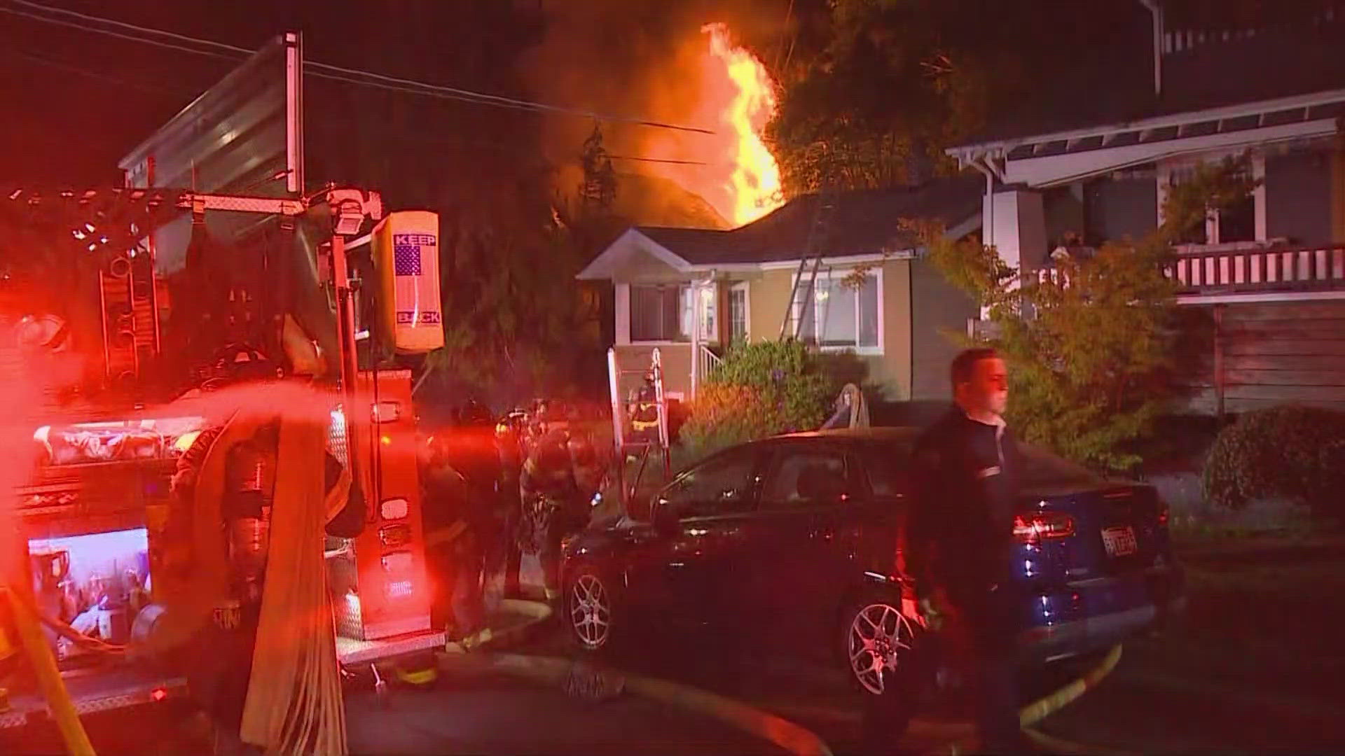 A woman was hospitalized after a house fire on Sunnyside Ave. N and N. 39th St. in Seattle's Wallingford neighborhood