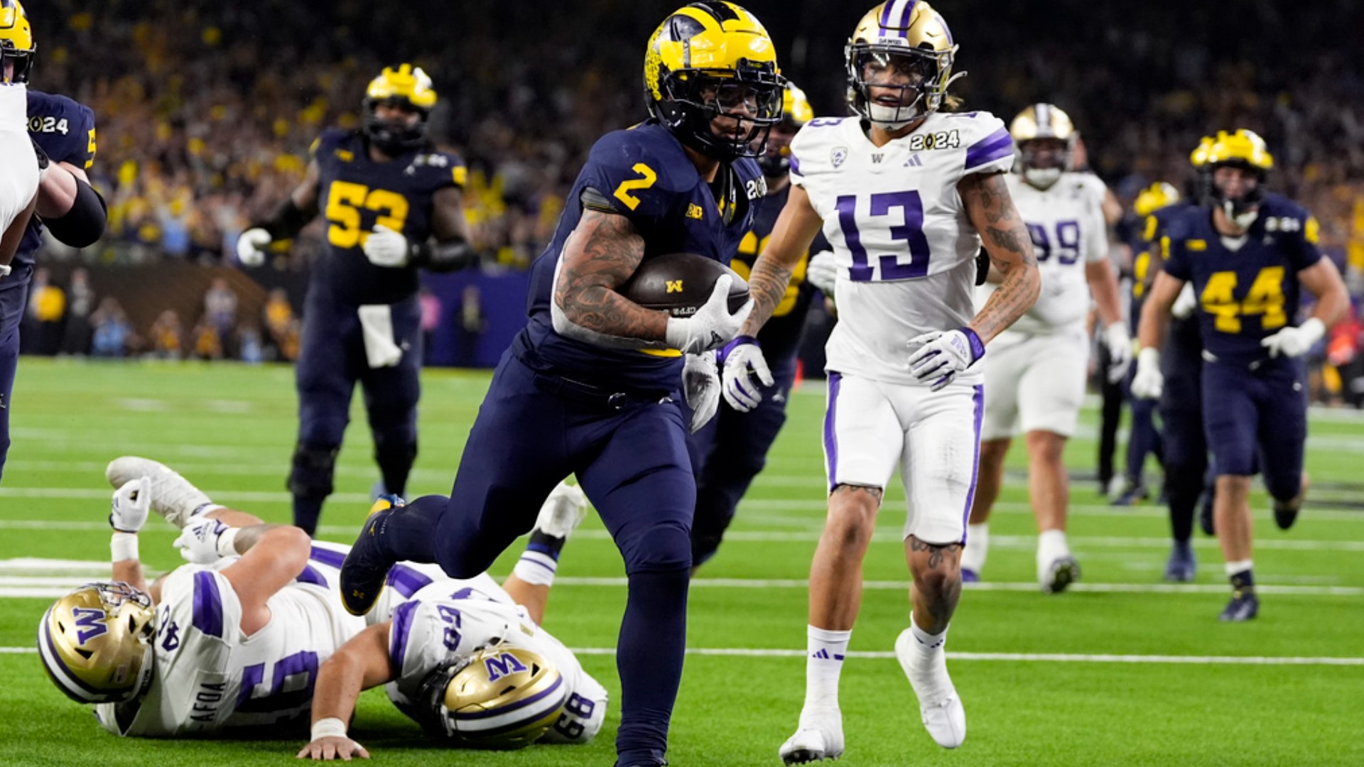 Washington loses 34-13 to Michigan in National Championship Game ...