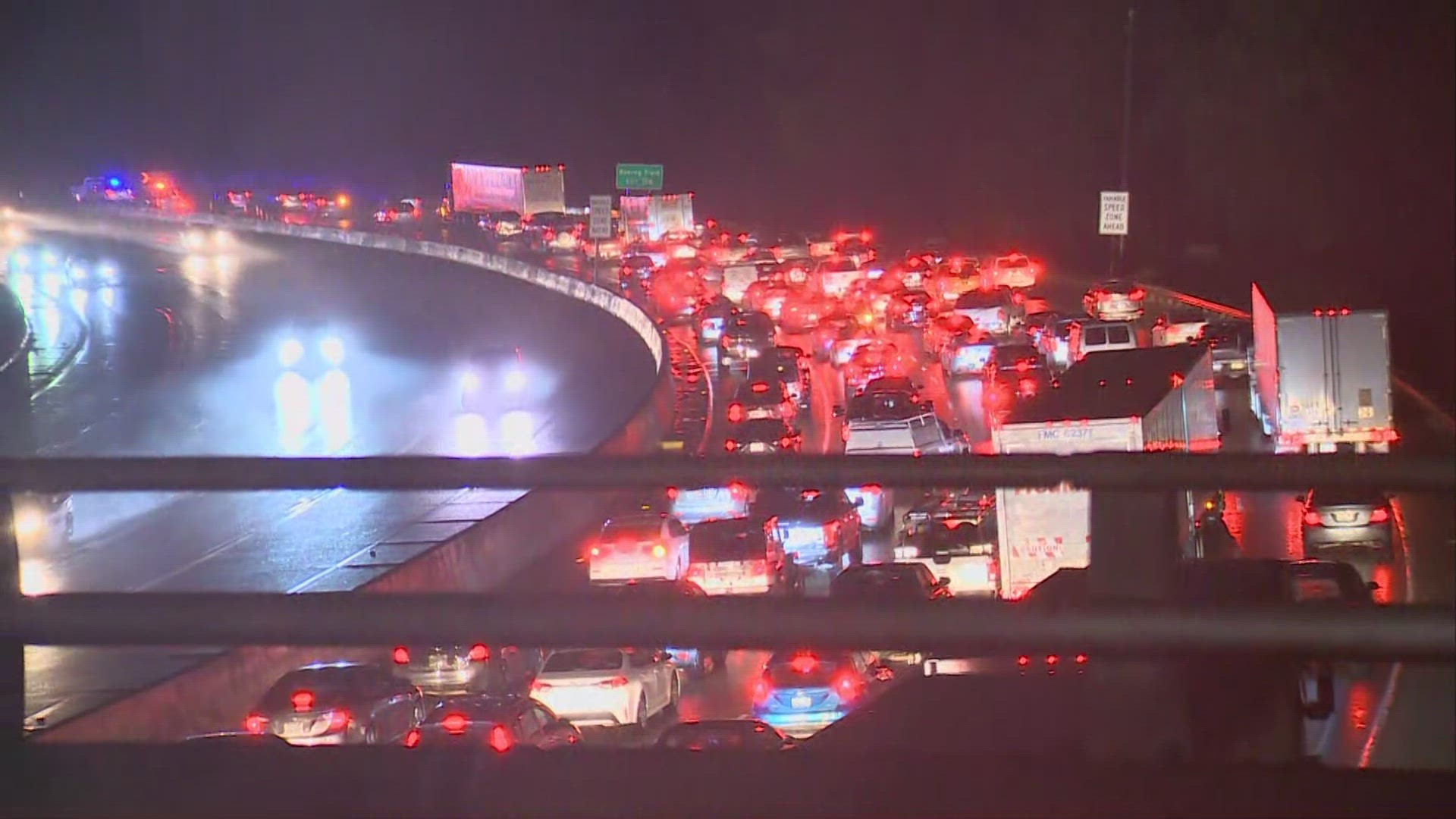 Two separate jack-knifed semis close to each other have I-5 N down to one lane near Tukwila