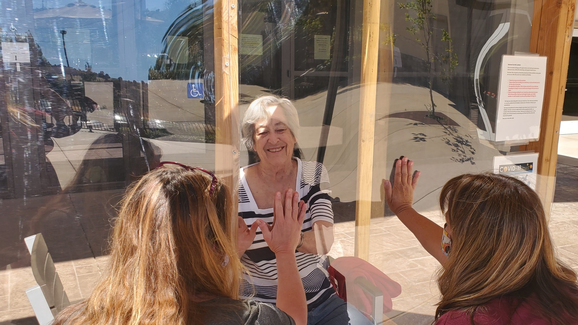 At three long-term care facilities in California, families got to visit loved ones through Plexiglas after COVID-19 forced nursing homes to restrict visitation.
