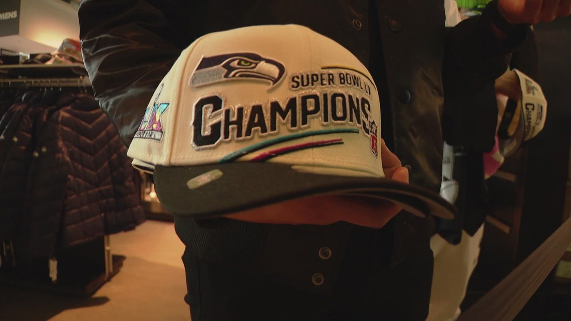 Seahawks fans shell out big bucks for championship gear despite long lines, steep prices