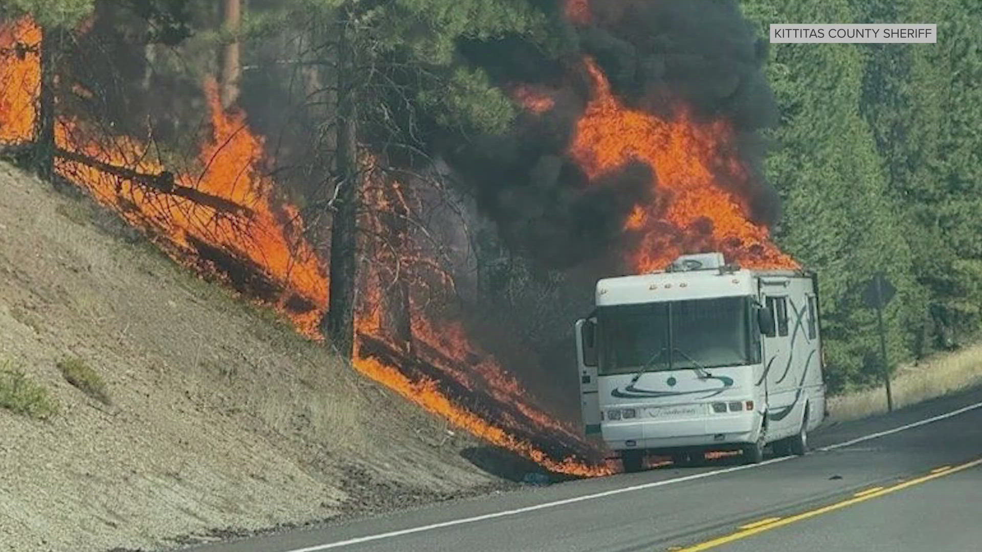 A motorhome caught fire on the side of Hwy 97 on Blewett Pass, sparking a 12 acre brush fire