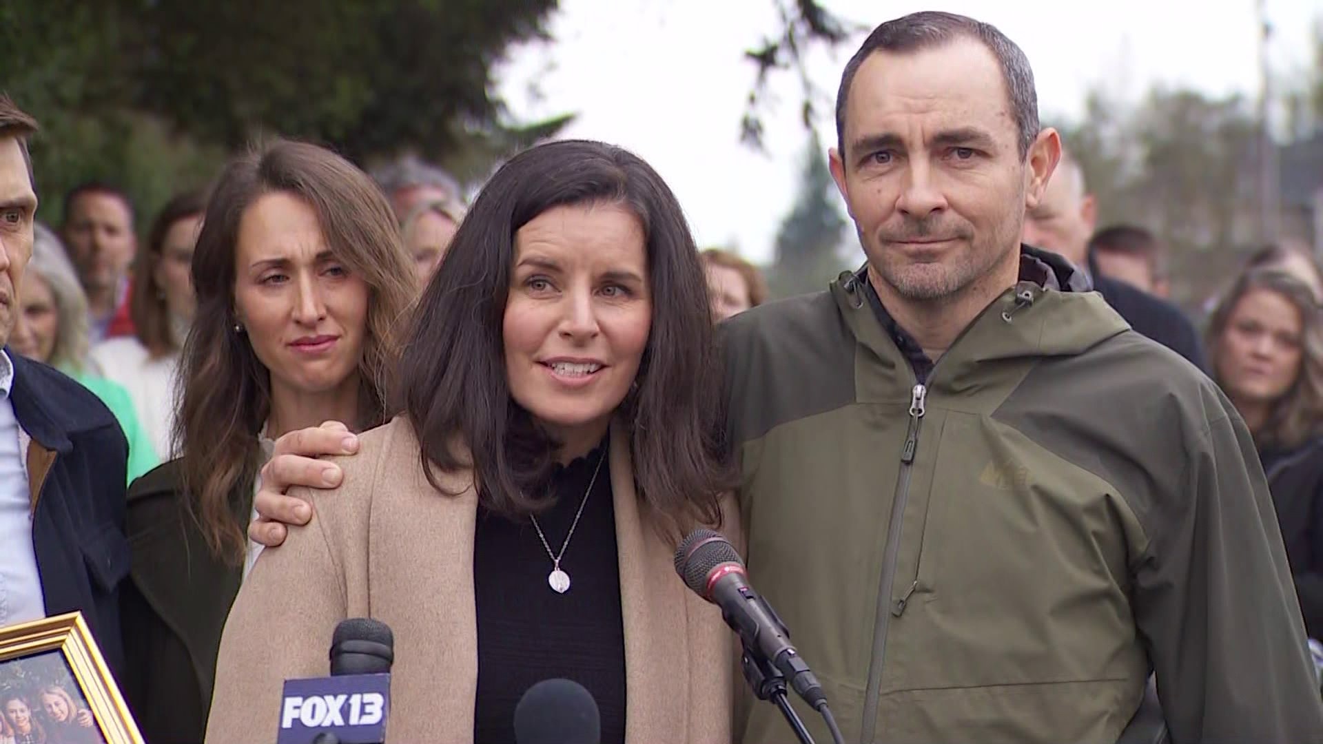 Jaron and Jessica Brown speak to reporters March 22, 2024 after their 12-year-old son Buster was killed in a car crash in Renton.