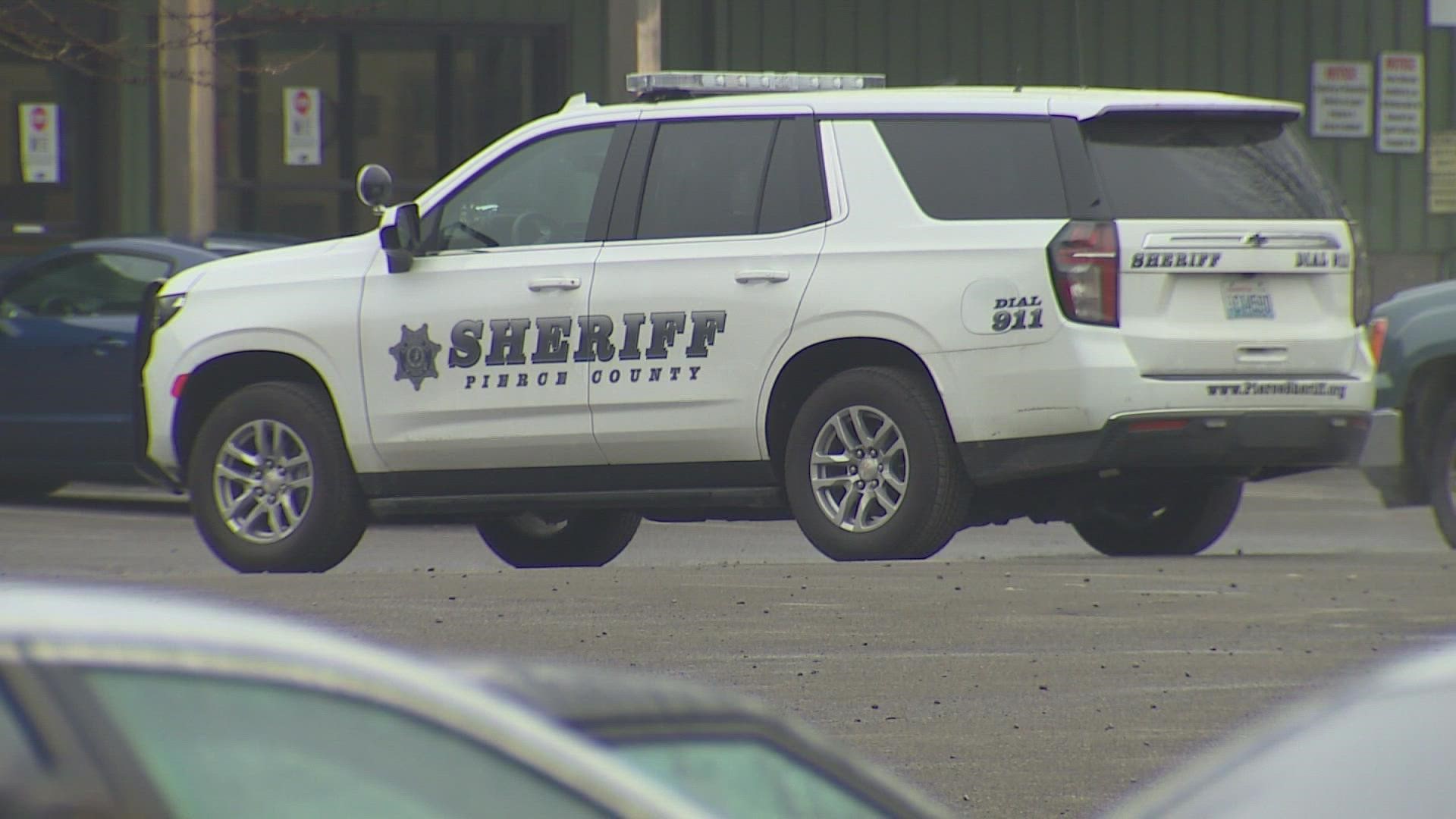 Two deputies were assisting with an investigation when they found the body.
