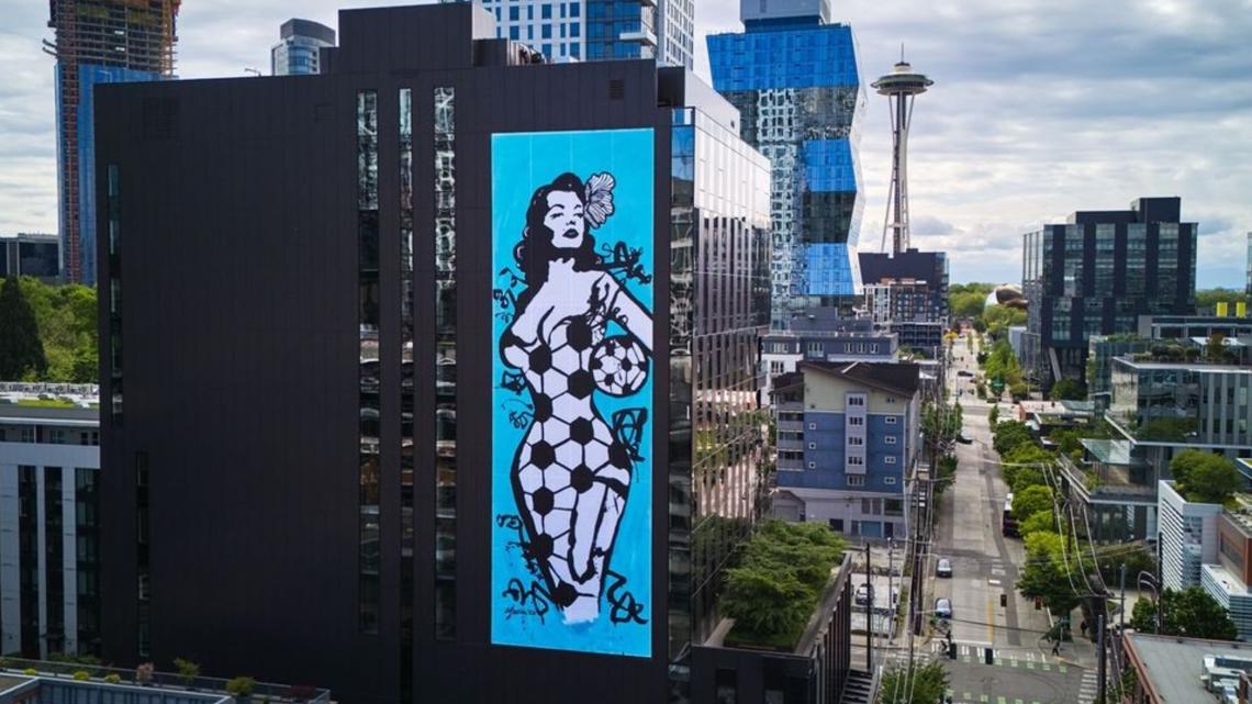 Seattle artist unveils 8-story mural celebrating city's global soccer role