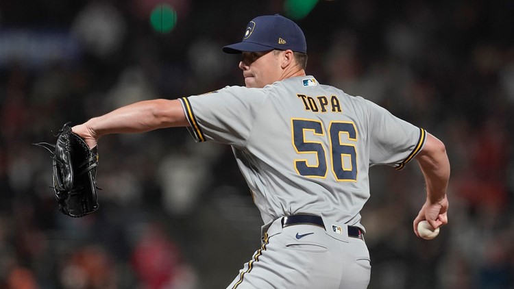 Mariners acquire right-hander Justin Topa from Brewers