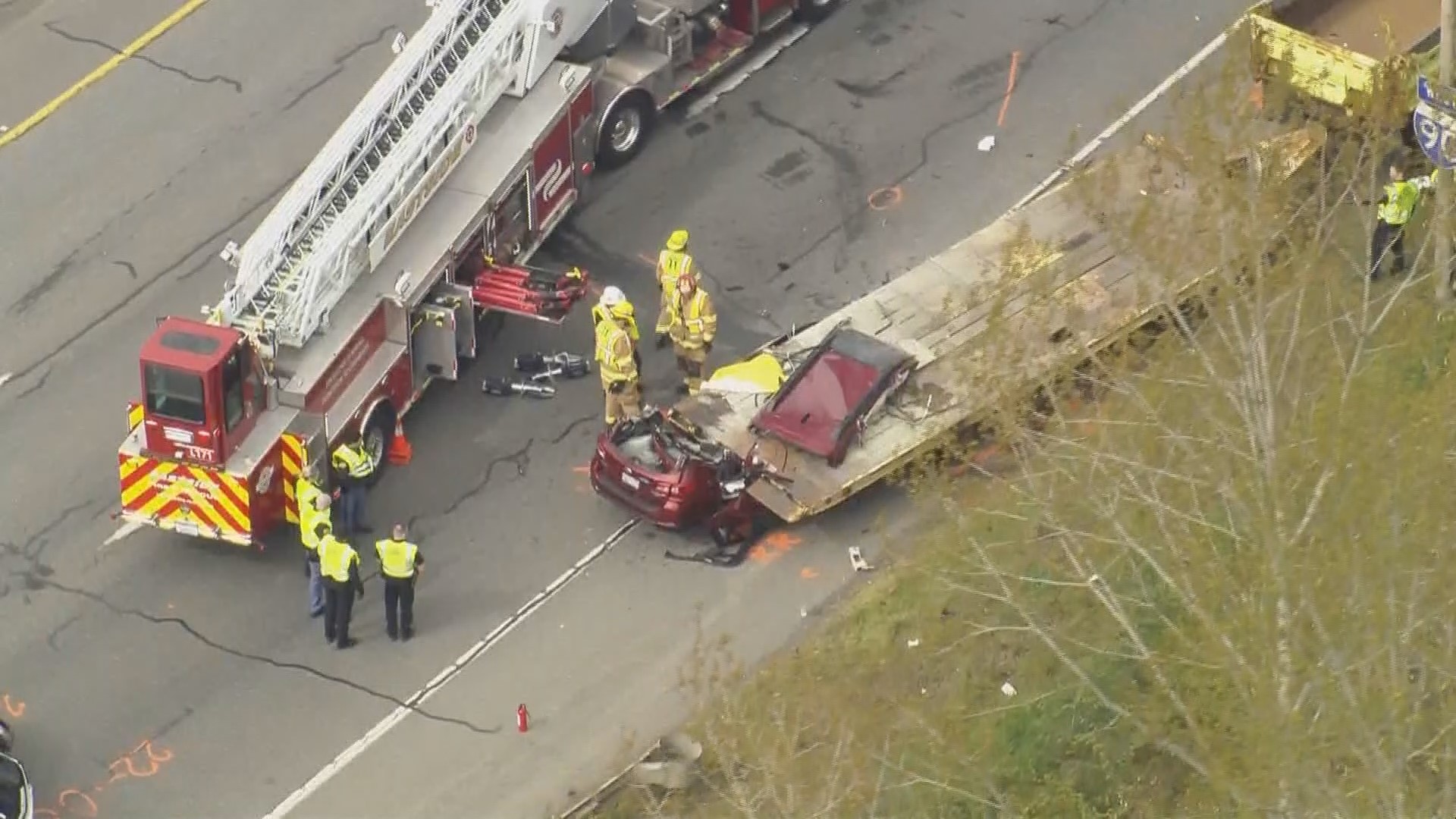 The Washington State Patrol said I-90 is partially closed after a vehicle drifted into the shoulder and hit a Washington State Department of Transportation trailer.