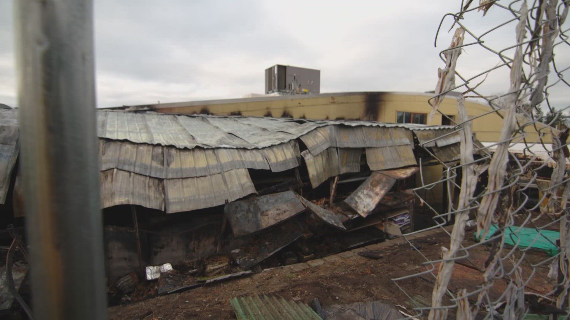 The fire heavily damaged a structure behind the supermarket that was used for inventory, including food. 