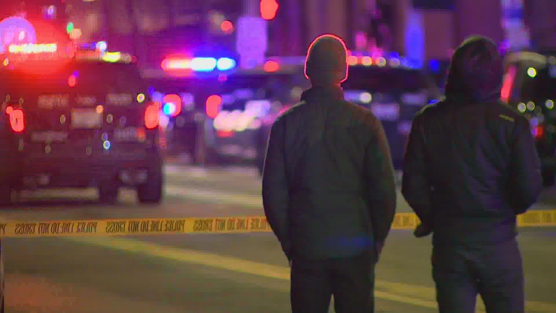 Seattle police shot and killed a man armed with a long gun outside the Federal Office Building in downtown Seattle Saturday night.