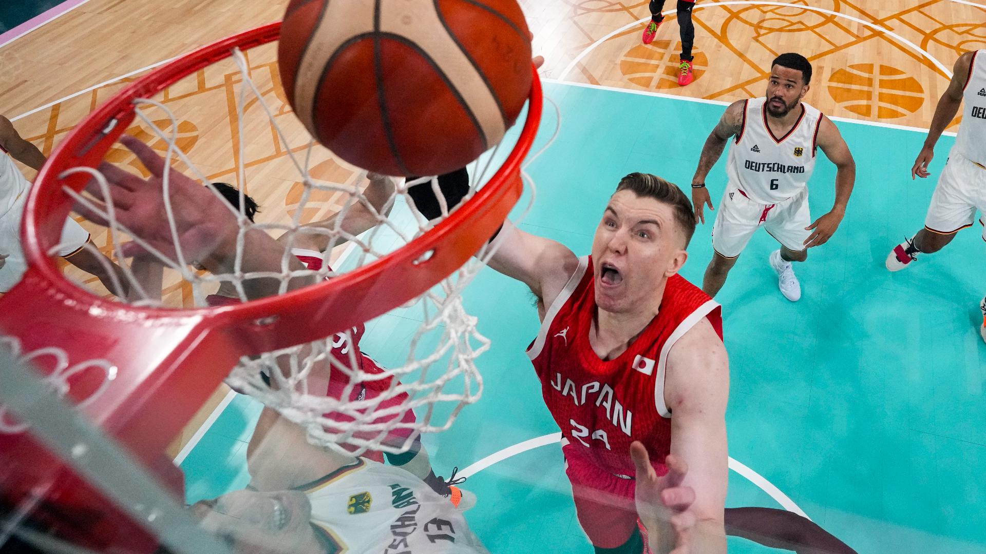 Josh Hawkinson's parents were both professional basketball players, and he is now representing the family name on the biggest stage in sports.