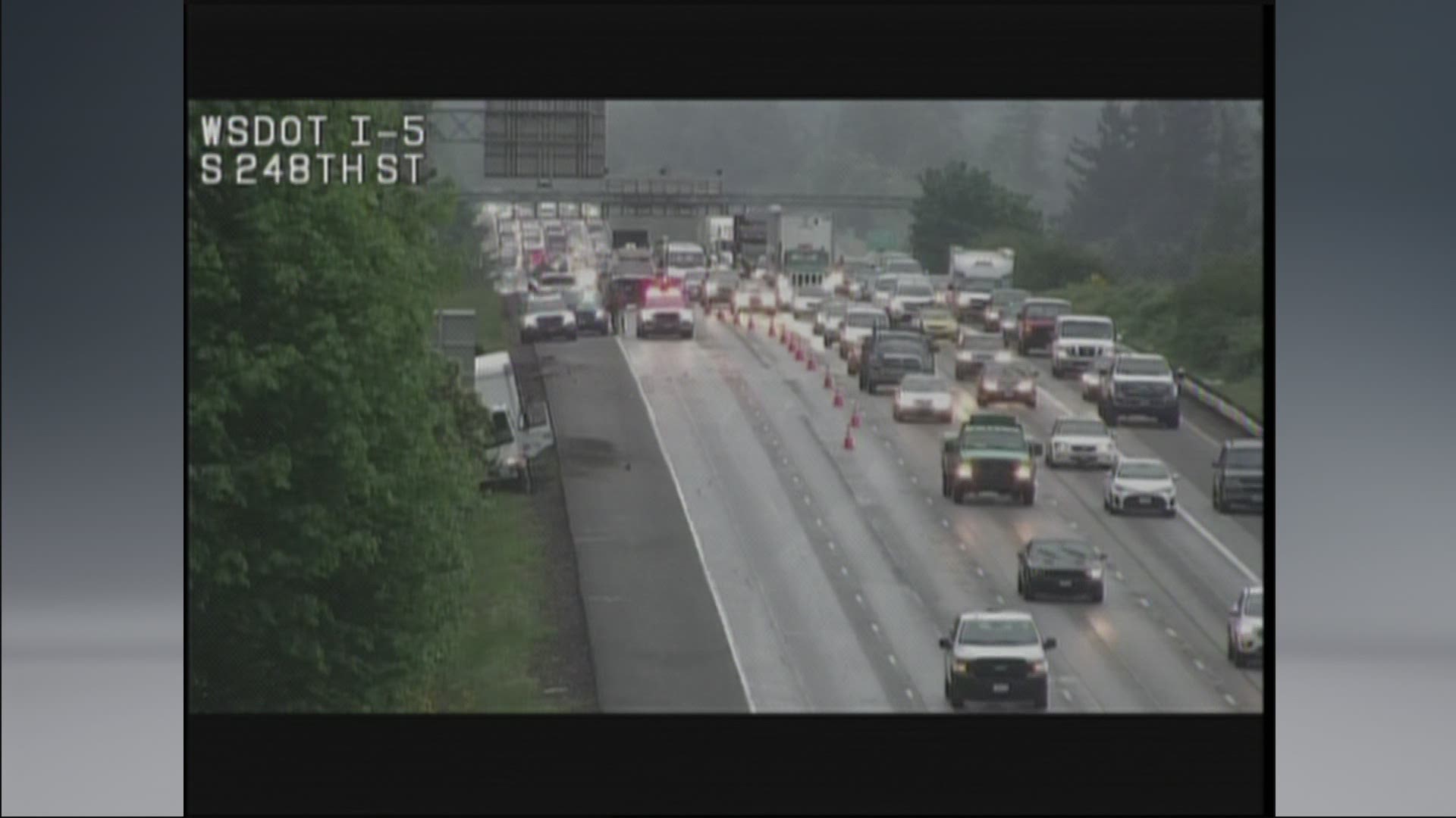 A box truck hit a disabled car on the side of I-5 N between Des Moines and Federal Way, causing the car to flip and seriously injuring the trapped driver.