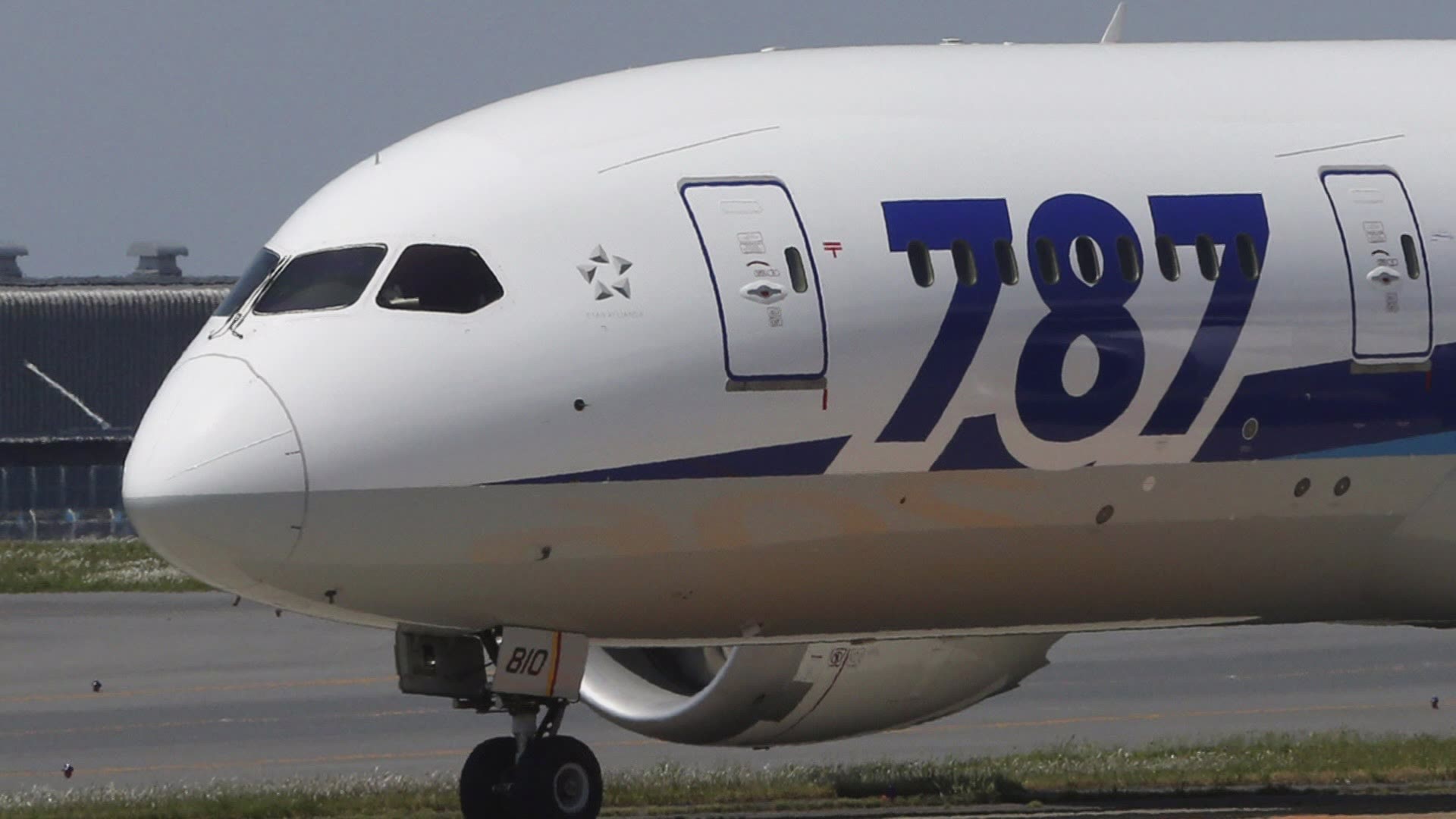 Boeing will cut production of its large 787 aircraft after a structural flaw was discovered in some undelivered planes.