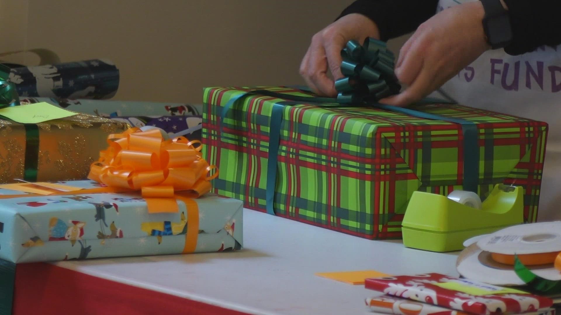 Dreading holiday wrapping? In exchange for a donation benefitting The Forgotten Children's Fund, The Seattle Gift Wrap Project will do it for you.