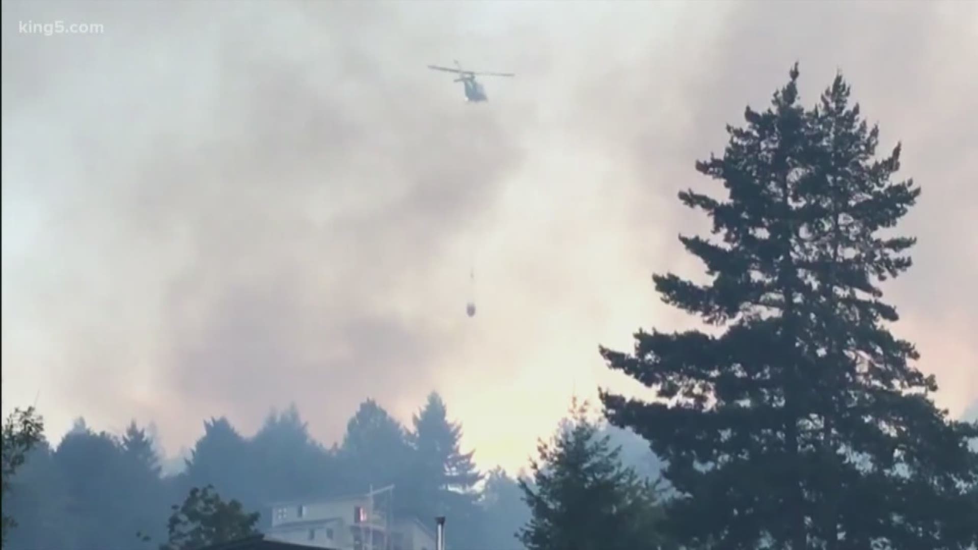 Homes were evacuated in Mason County as crews battled a five-acre fire Thursday night. Officials said the Union Bank fire was moving uphill from Highway 106 in the town of Union. About 20-30 homes were in the evacuation zone.