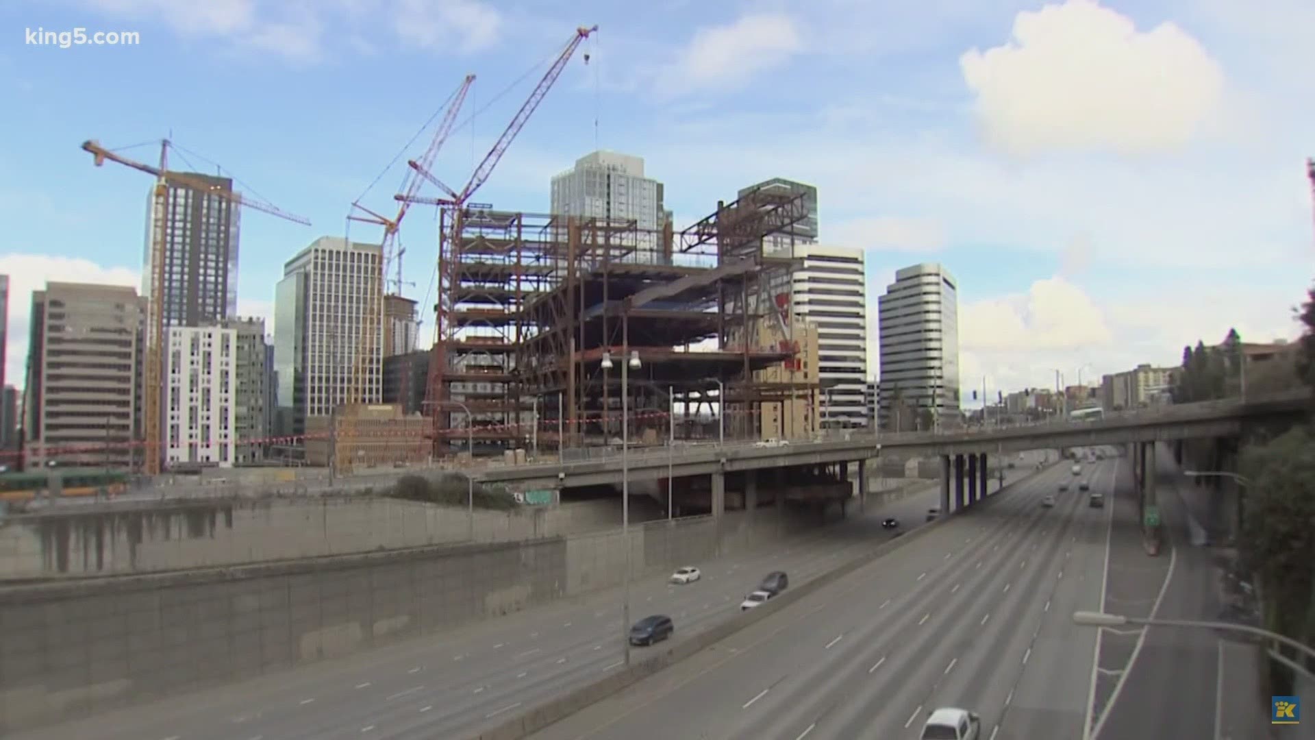 The nearly $2 billion project in downtown Seattle has been hampered by the sudden drop in hotel revenues last year, which were being used to pay for the expansion.