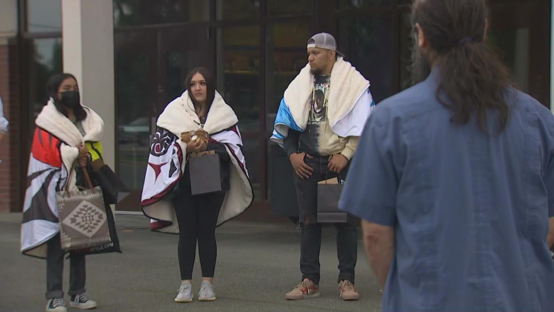 An informal ceremony was held in front of Puyallup High School to honor three students who recognized the tribal roots of the land.