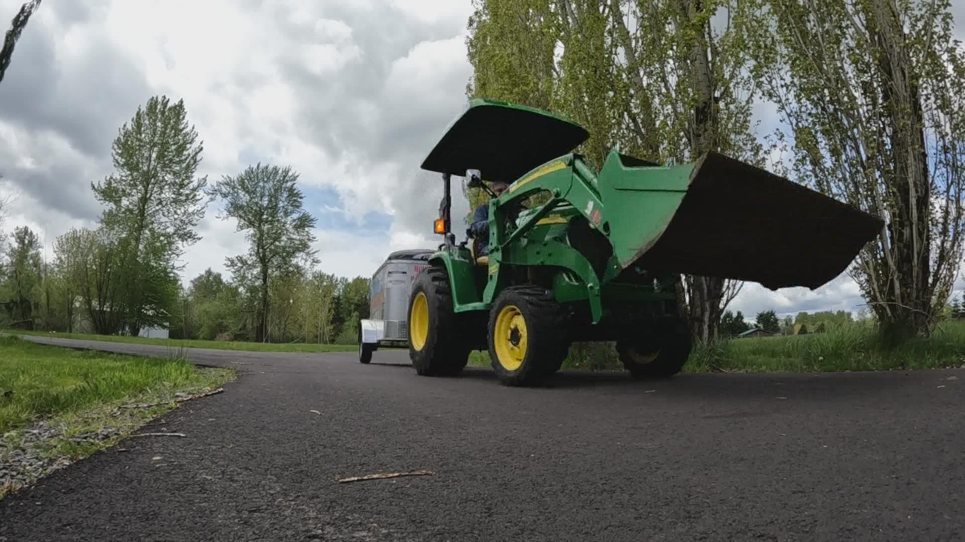 76-year-old Mike Adkinson is preparing to pull a trailer with his John Deere tractor more than 1,700 miles from Bellingham to Minnesota to honor his brother.