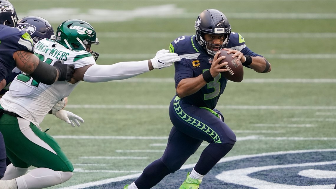 Russell Wilson's throws four TD passes as the Seattle Seahawks