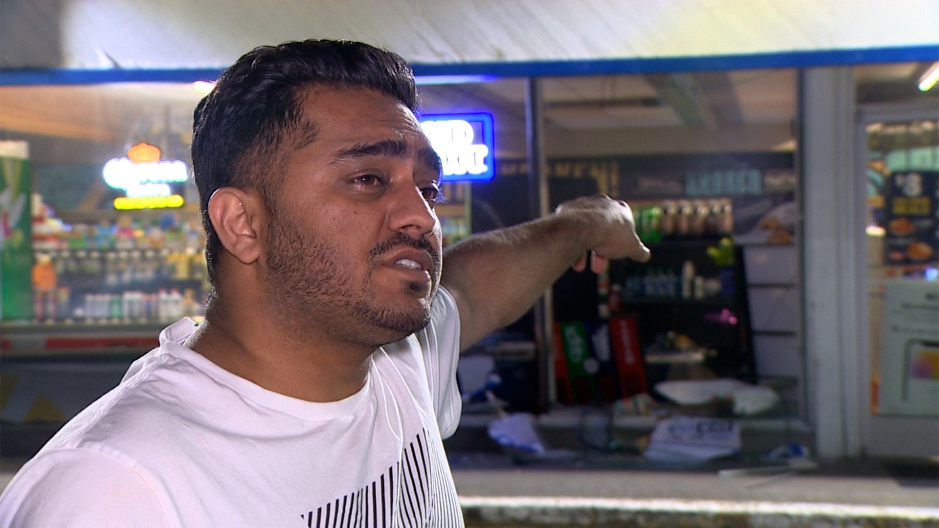 A Burien gas station clerk discusses an early morning botched burglary he stopped where the suspects shot at his car multiple times