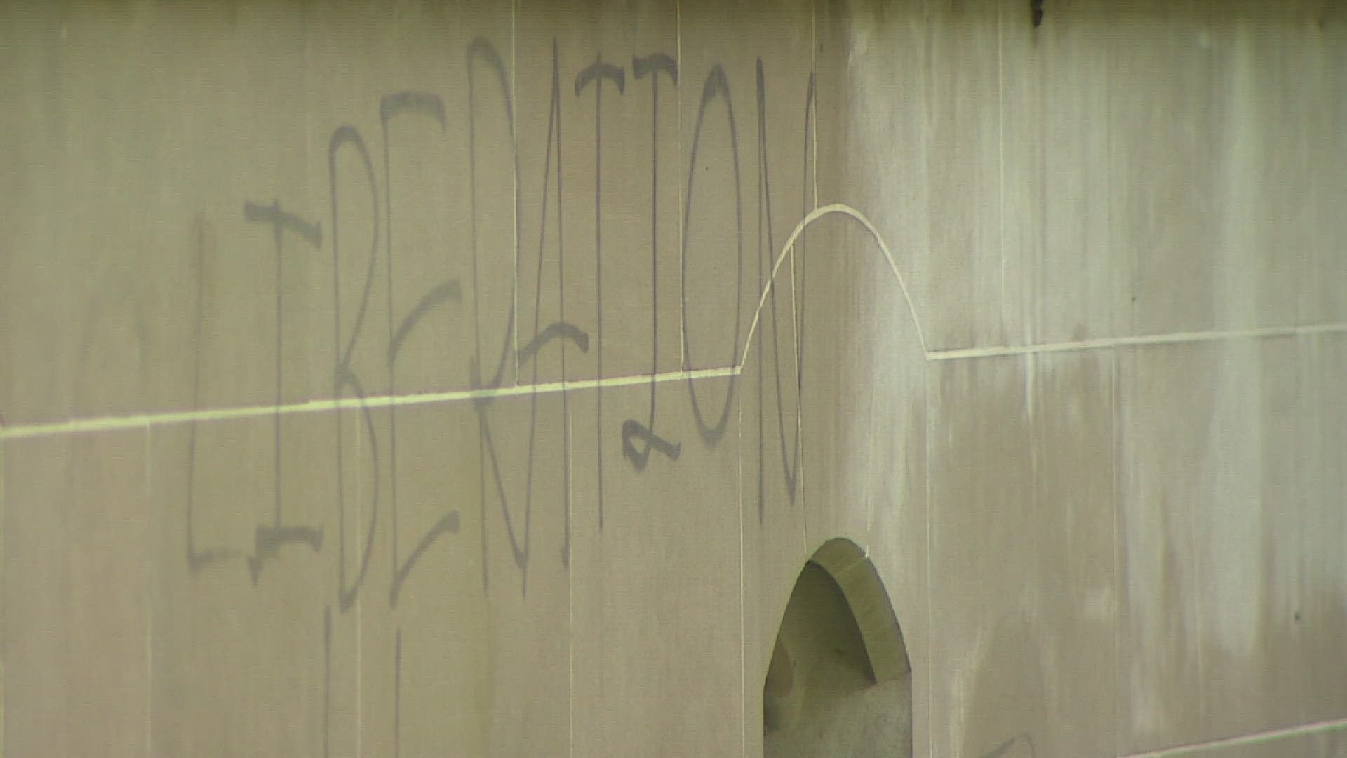 Crews cleaned graffiti at the University of Washington campus near a pro-Palestinian encampment on May 15, 2024.