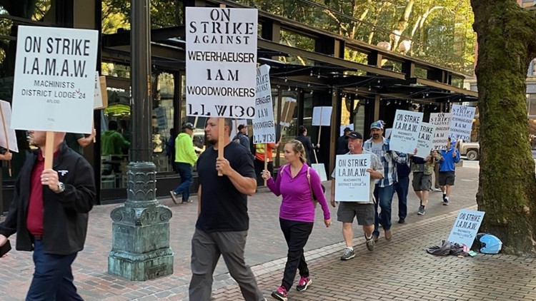 Union members picket outside Weyerhaeuser headquarters in Seattle