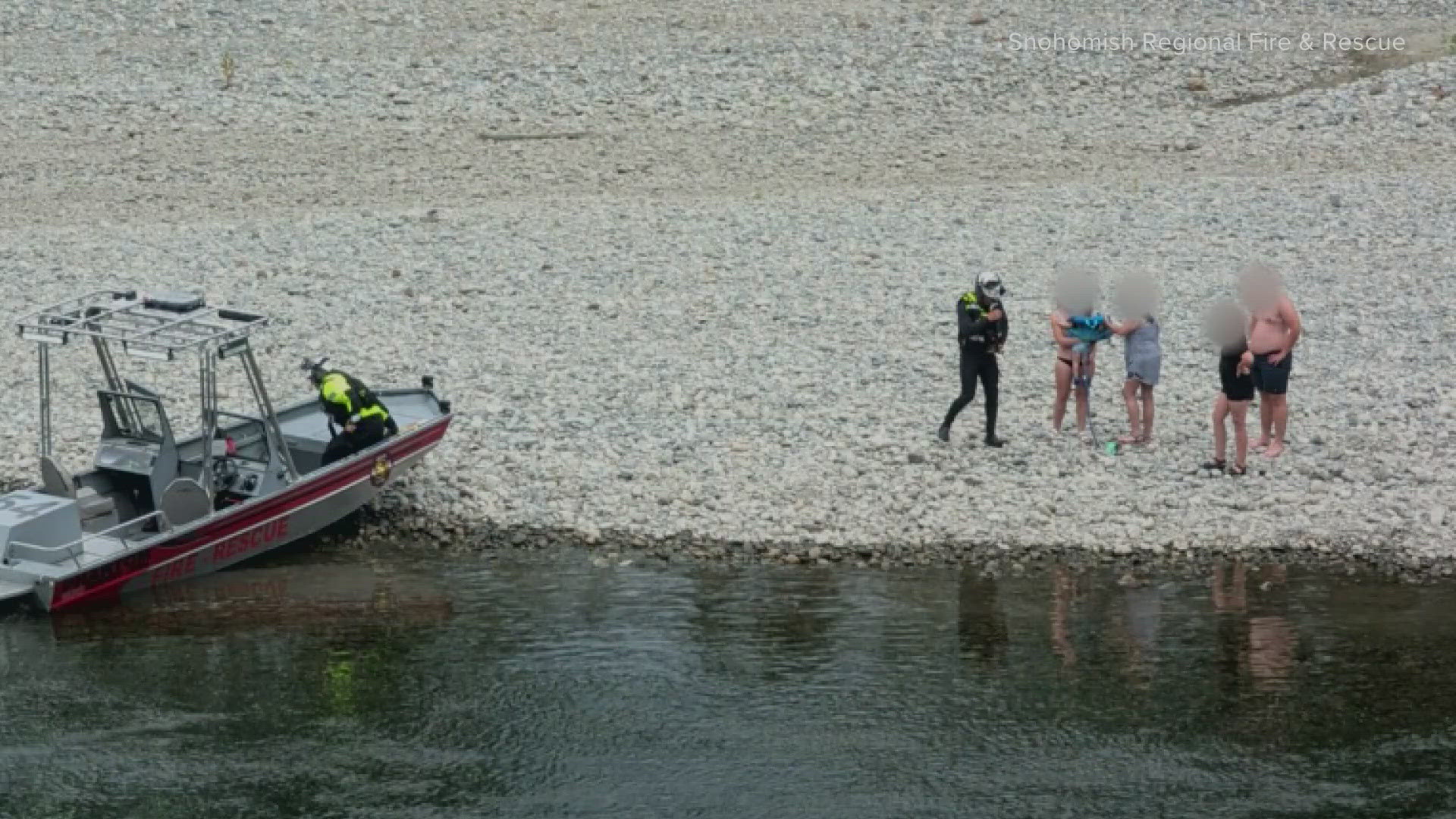 The people were floating the Skykomish River when their innertubes got caught on a strainer, which is a group of logs or root balls straining river water.