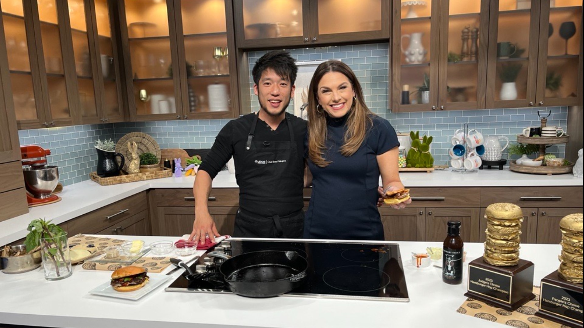 Chef Shota Nakajima from Taku shows Amity how to make one of their delicious burgers. #newdaynw