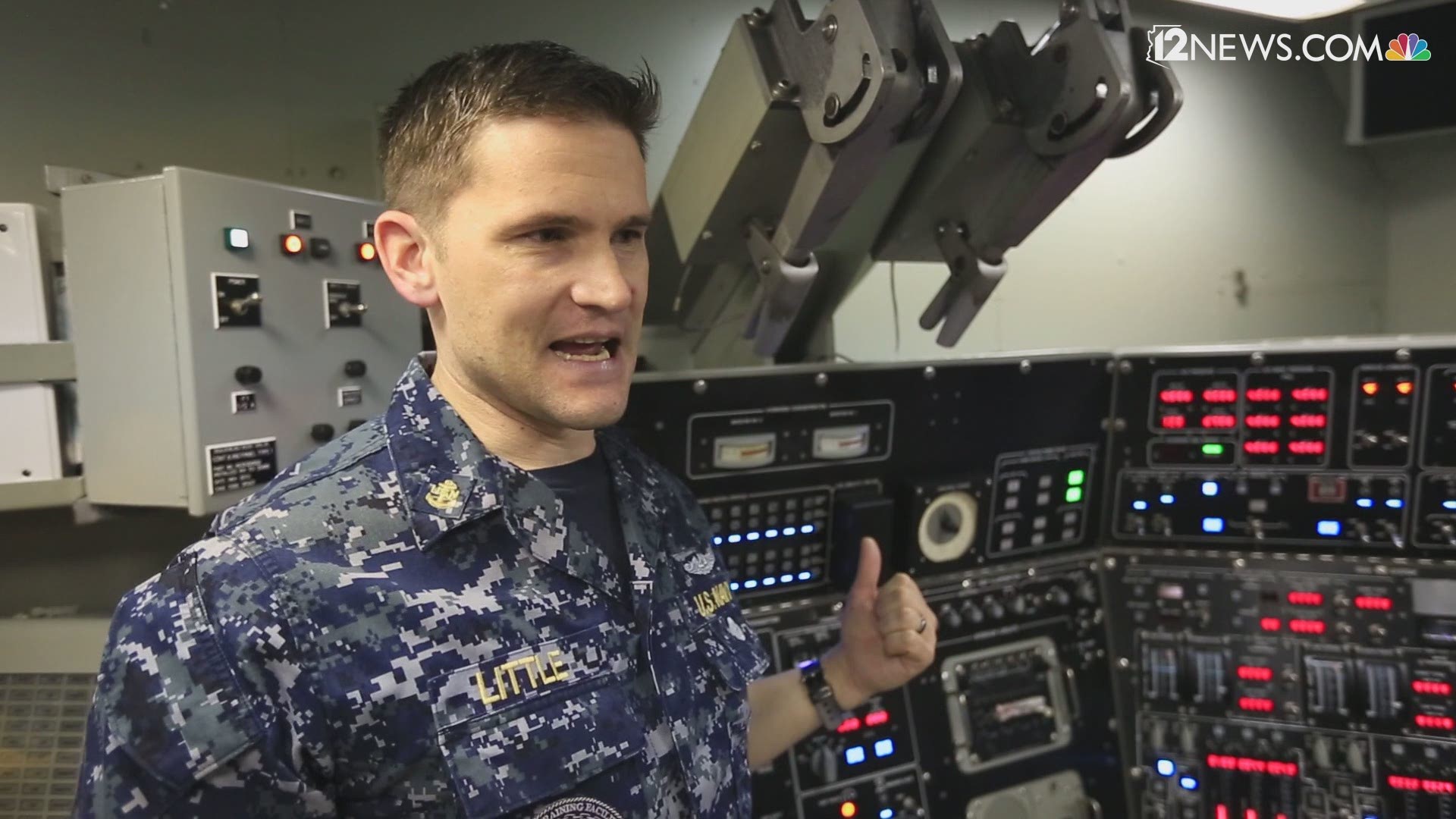 The crew aboard the USS Kentucky demonstrates an emergency blow, where the submarine rises quickly to the surface.