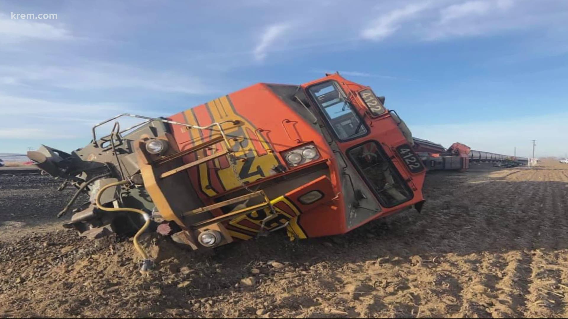 Three engines and seven cars of a BNSF train derailed near Mabton after a semi-truck hauling a piece of farm equipment hit it.