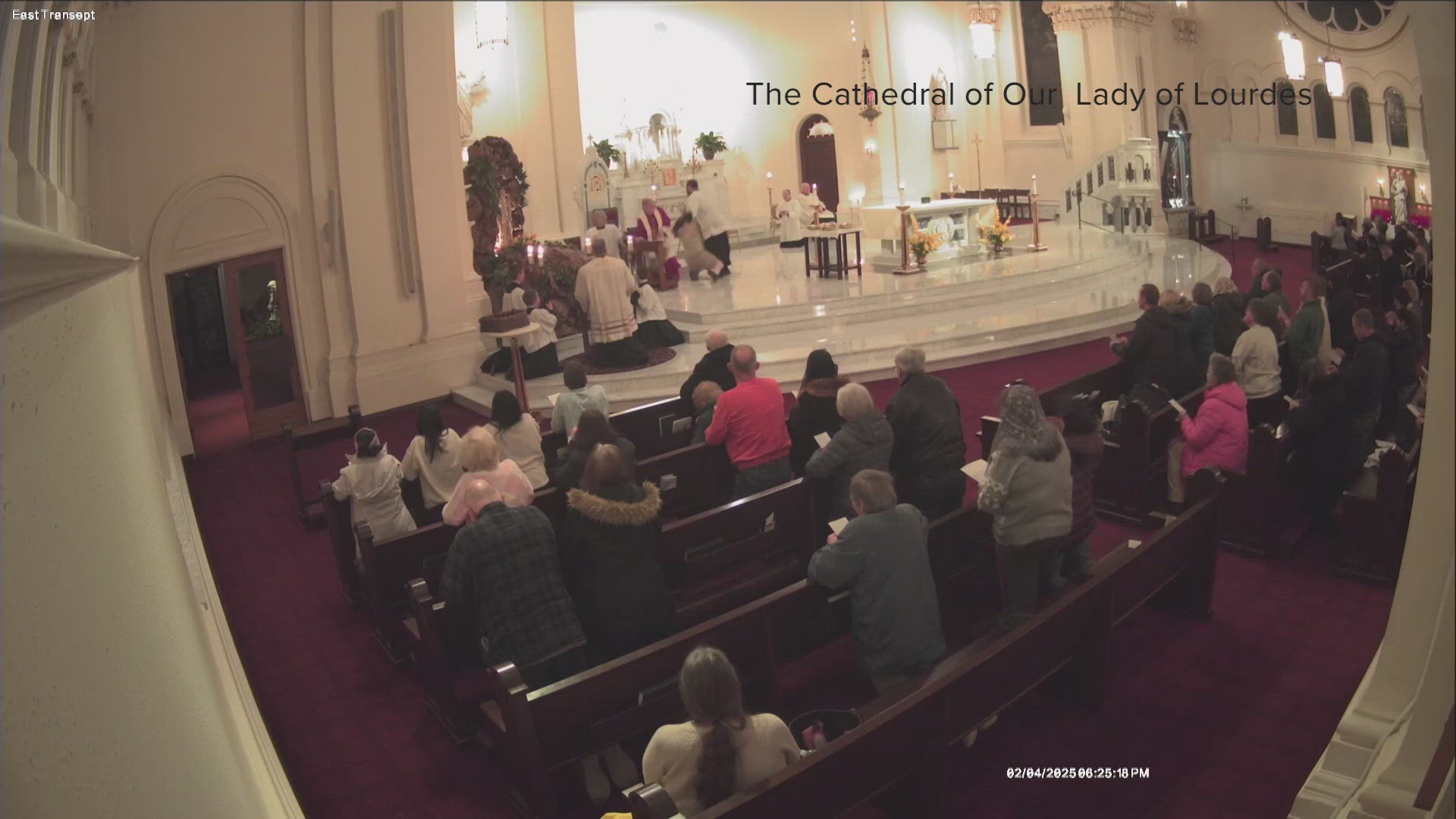 A man allegedly attacked a priest during a service at Spokane's Cathedral of Our Lady of Lourdes.