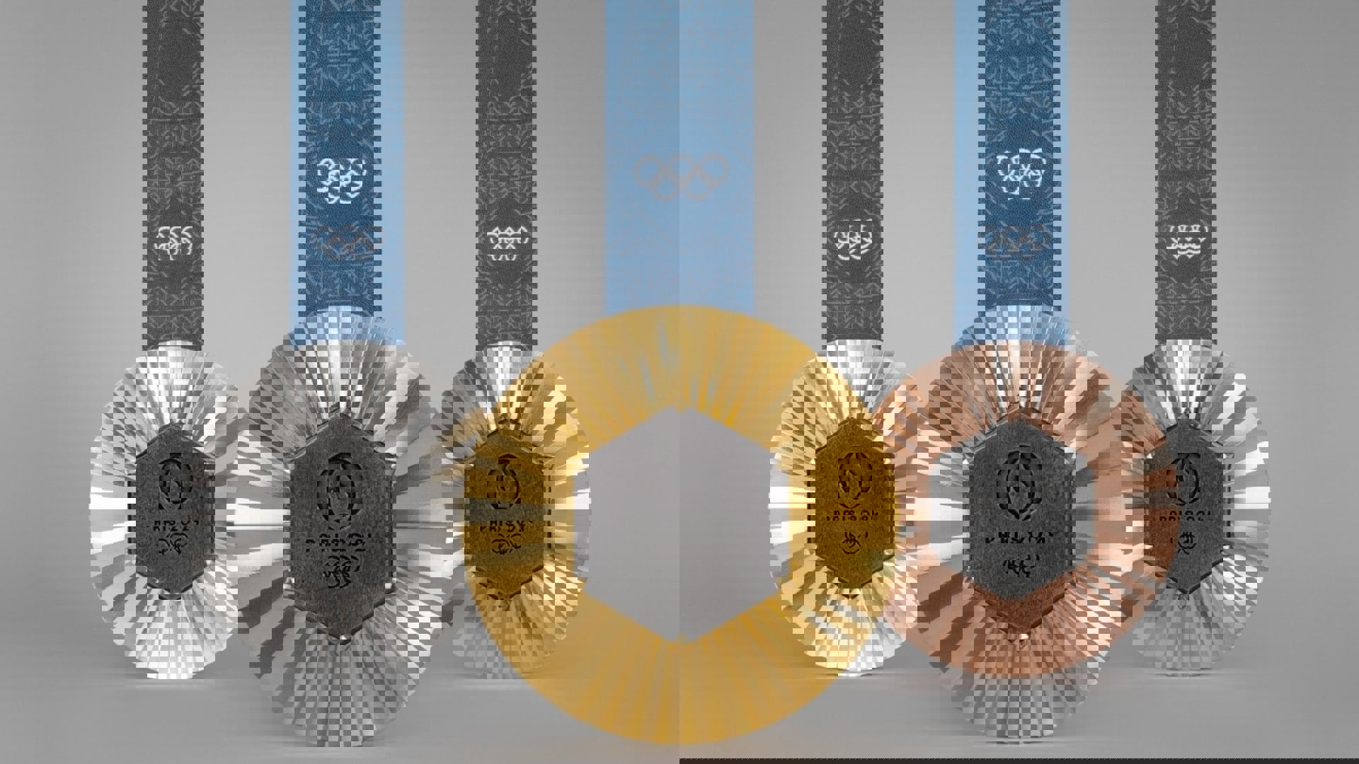 Though Australia and the United States both earned five medals on the first full day of competition, Australia leads with three gold medals.