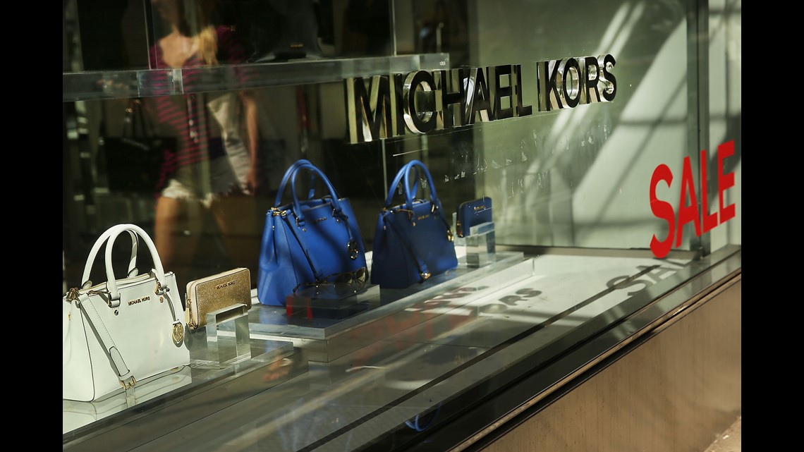 Michael Kors to close up to 125 stores as luxury retail woes deepen |  