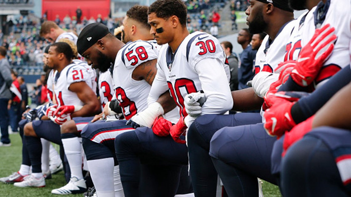 Fans burn Dolphins jerseys to protest anthem kneeling