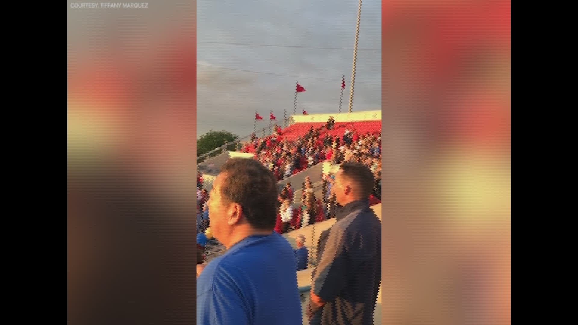 When the announcer of a softball game took to the mic to say the national anthem would not be played, the crowd took tradition into their own hands.
