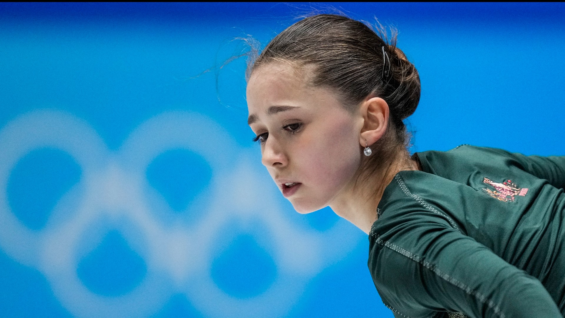 The ruling allows Kamila Valieva to compete in the women's figure skating program at the Olympics. It does not address the team figure skating gold ROC won.