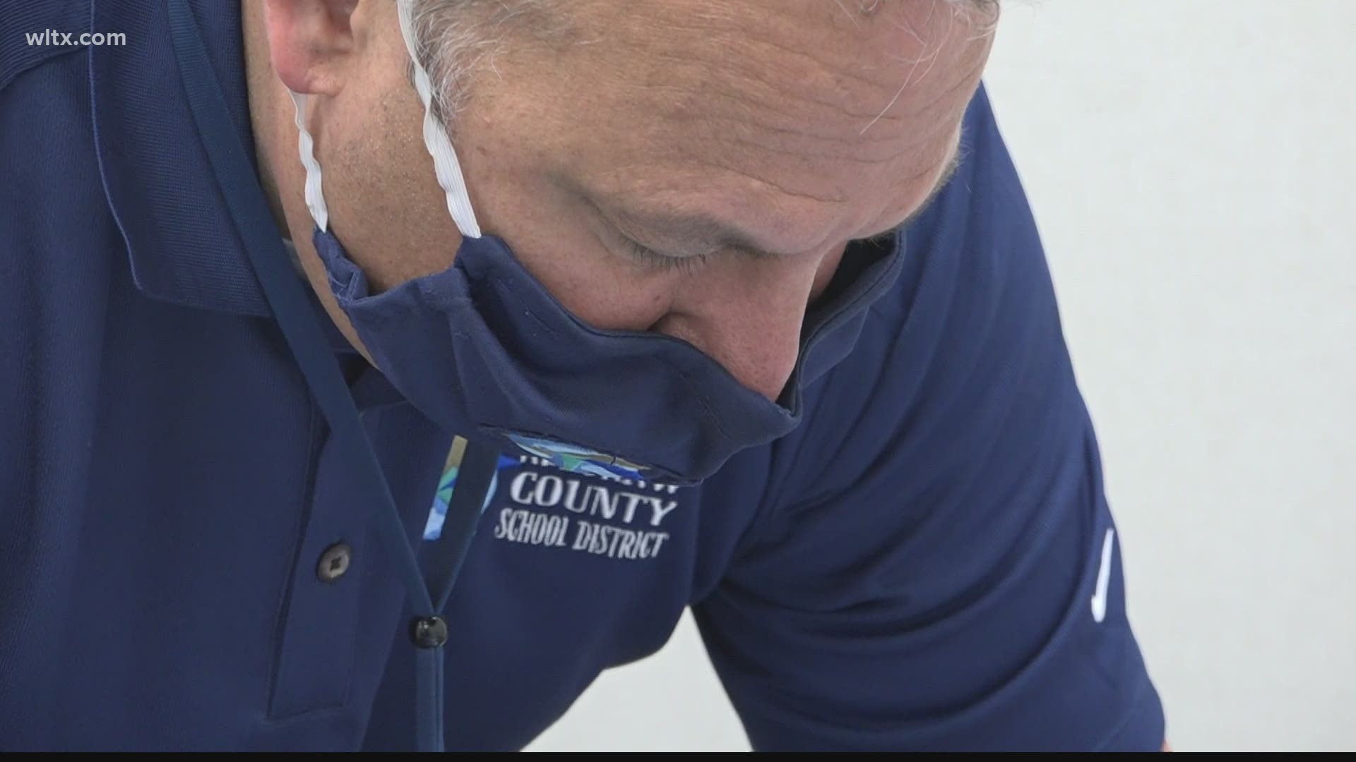 As Kershaw school district employees got their second vaccine shot, a familiar face was behind that second dose.